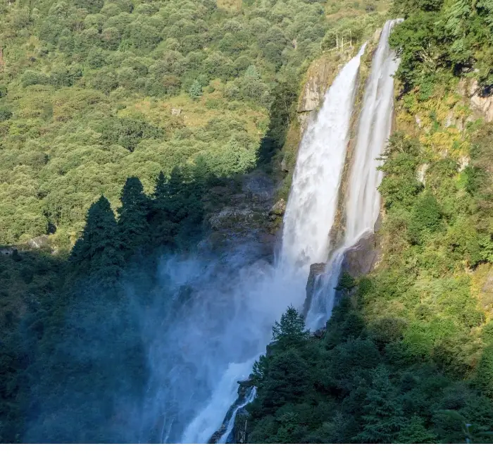 Waterfall and forest landscape in Northeast India
