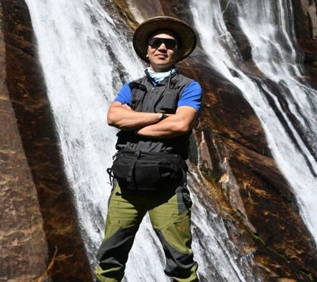 Joho by a waterfall in Northeast India