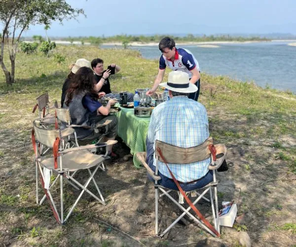 Riverside meal on a relaxed holiday in Northeast India