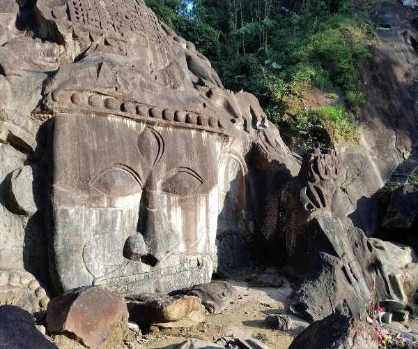 Rock-cut heritage site in Tripura on a Northeast India motorcycle tour