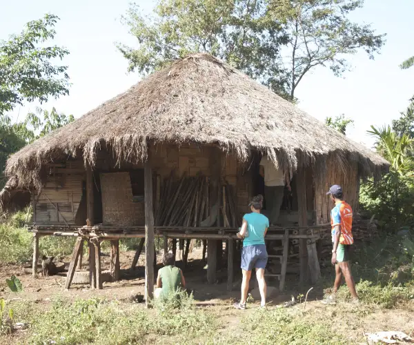 Basket making inside a traditional home in Arunachal Pradesh