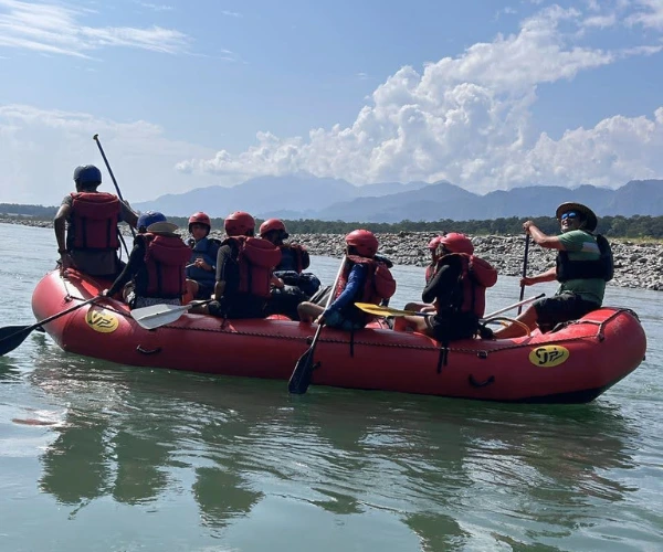 Youth expedition group rafting on a river in Arunachal Pradesh