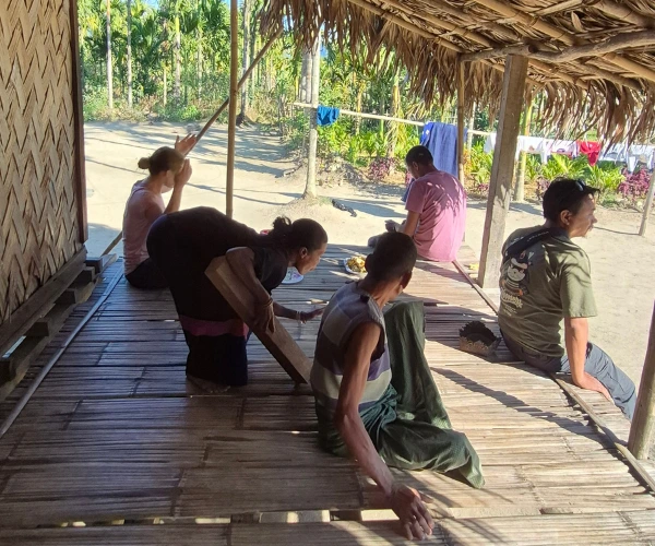 Young travellers spending time with a local family in Arunachal Pradesh
