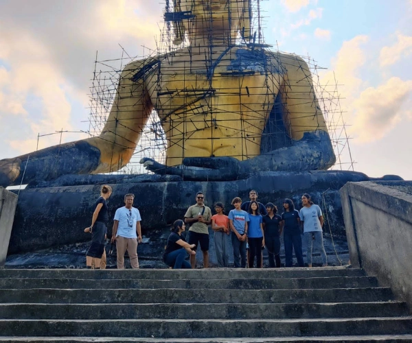 Family group at a Buddha statue in eastern Arunachal Pradesh