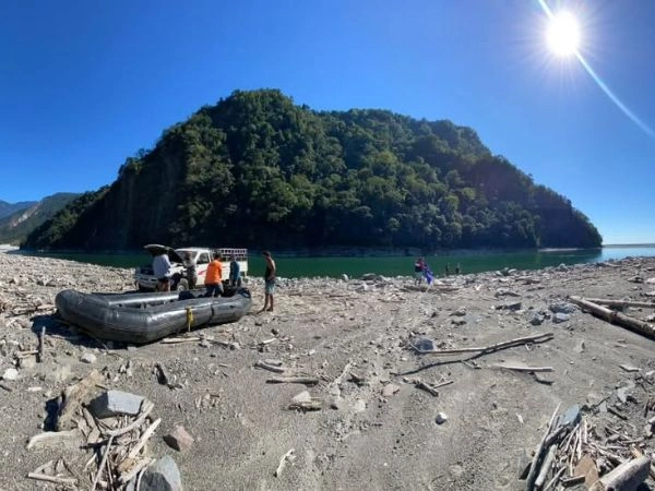Riverbank raft stop on an active holiday in Eastern Arunachal Pradesh