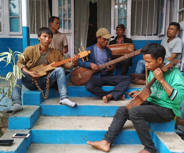 Local musicians performing traditional music during a Meghalaya youth expedition