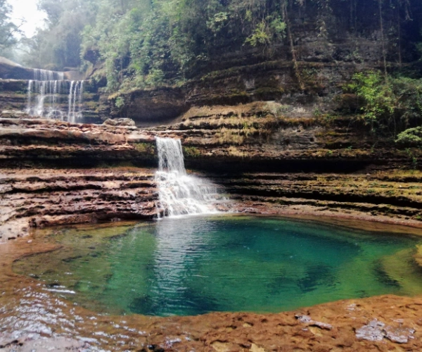 Waterfall pool on a Meghalaya bike tour