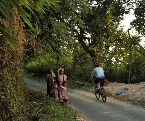 Cycling a quiet village road in Meghalaya