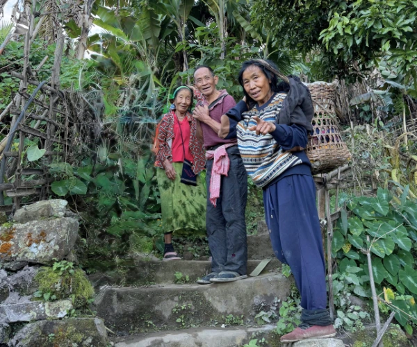 Local people on village steps in Northeast India