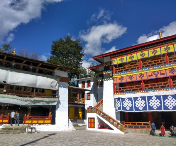 Colourful monastery courtyard on a western Arunachal family adventure tour