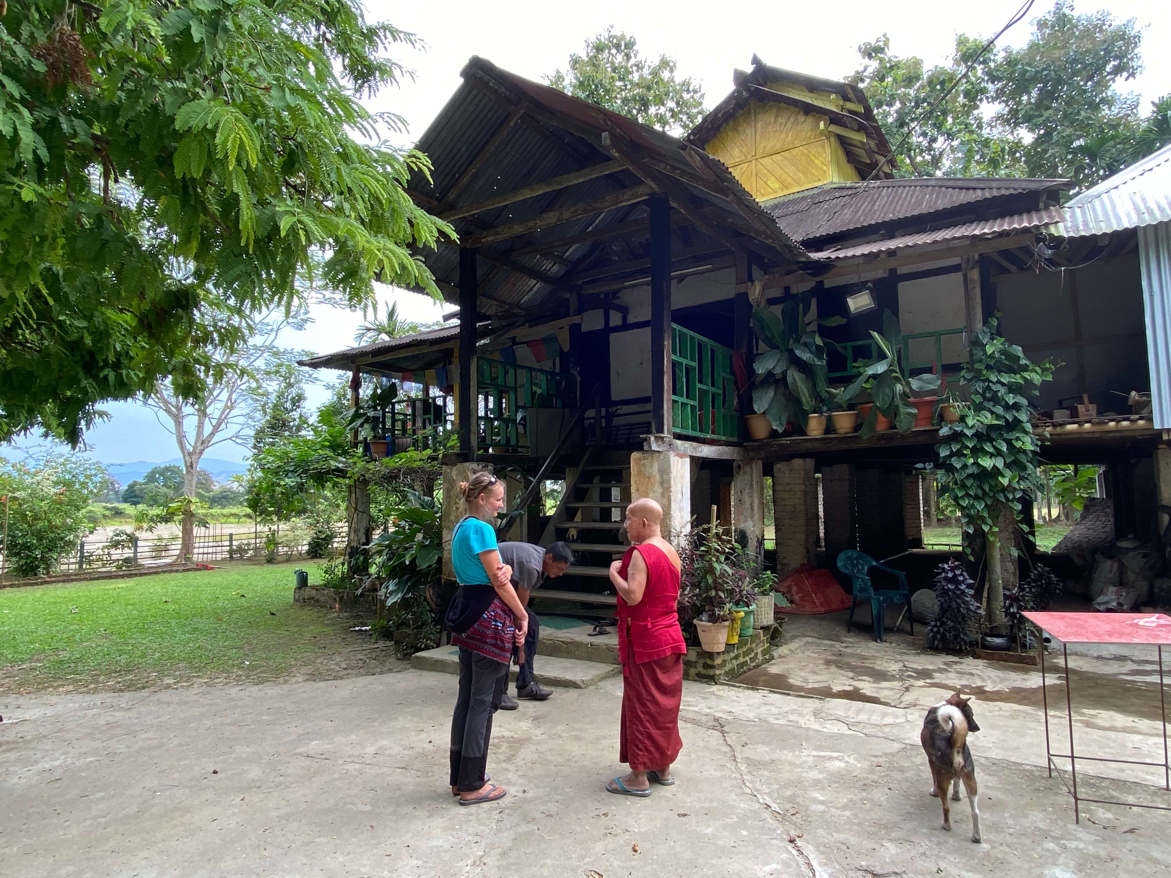 A traveller conversing with a monk in North East India